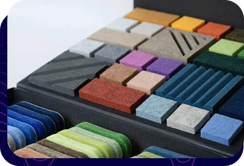 A sample book with a wide range of acoustic material samples in various colors and textures.